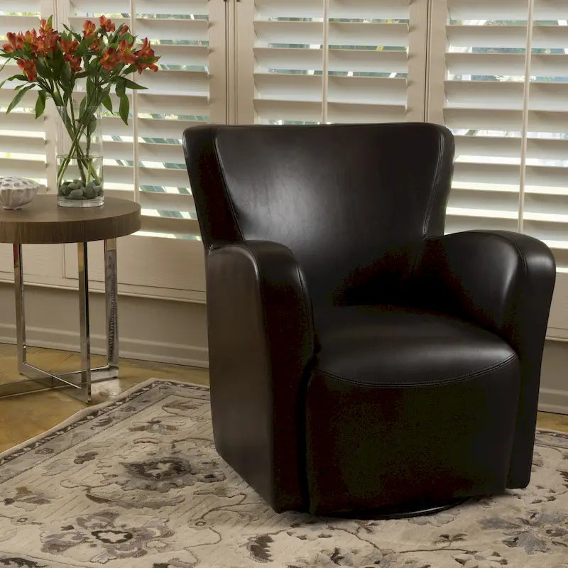 Fauteuil club pivotant à oreilles Angelo en cuir reconstitué