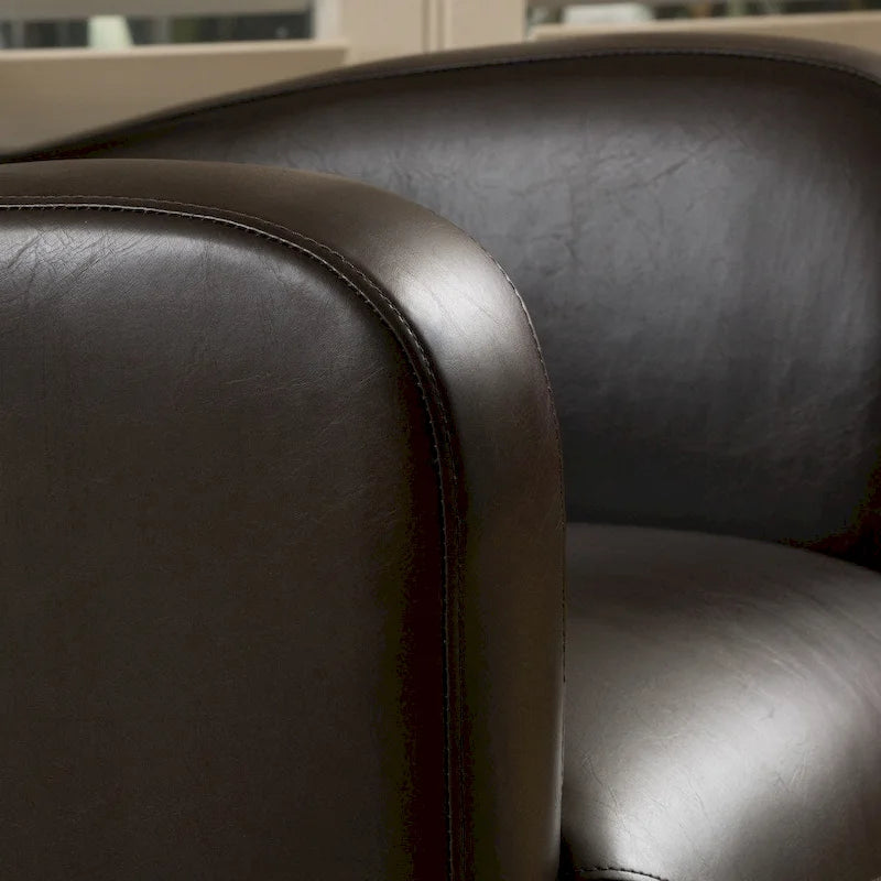 Fauteuil club pivotant à oreilles Angelo en cuir reconstitué