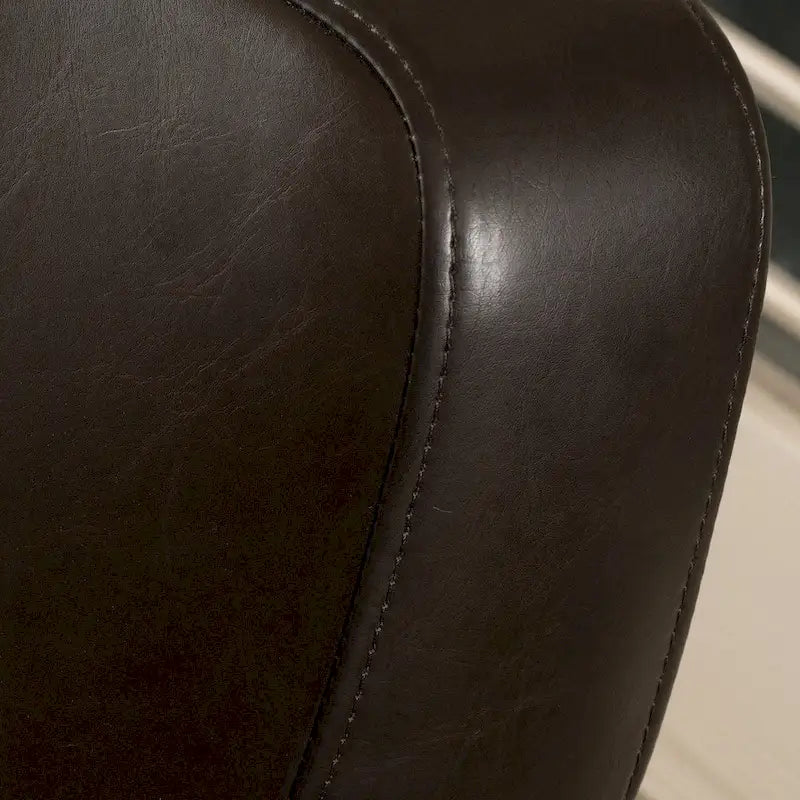 Fauteuil club pivotant à oreilles Angelo en cuir reconstitué