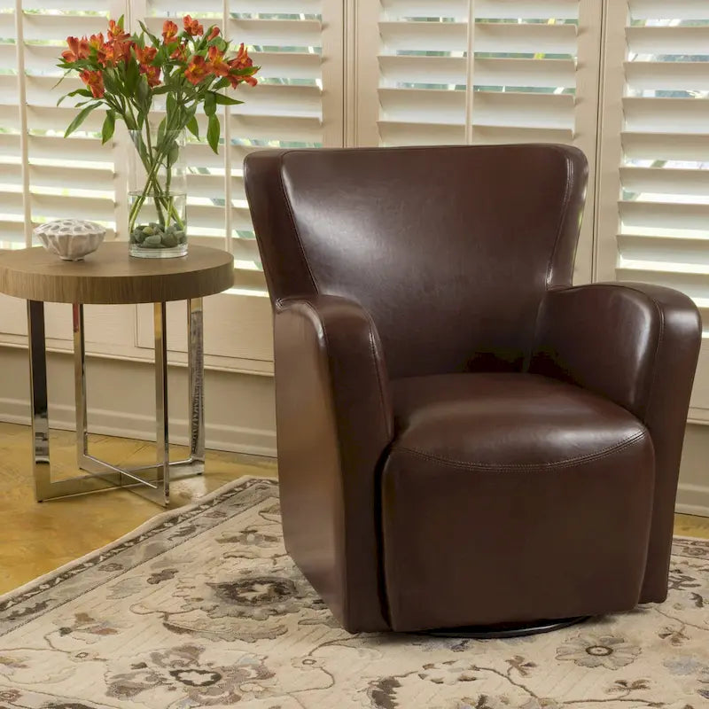 Fauteuil club pivotant à oreilles Angelo en cuir reconstitué